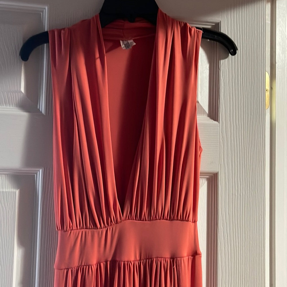 SAN JULIAN CORAL V CUT FRONT JUMPSUIT WITH SLIT ON LEGS!